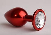 Анальная пробка из металла красного цвета с прозрачным кристаллом