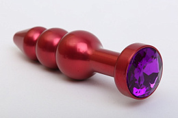 Анальная пробка елочка красного цвета с фиолетовым кристаллом