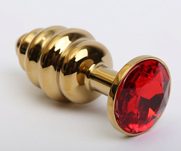 Золотистая металлическая пробка с красным кристаллом