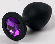 Черная силиконовая анальная втулка с фиолетовым кристаллом